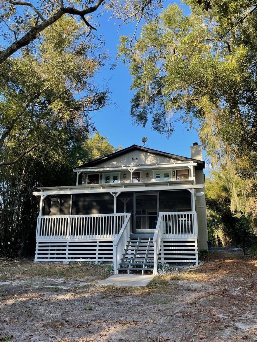 This newly renovated pool home is located on a small, quiet lake in the highly desired City of Debary. This home features 2 bedrooms with a third room that could be used as a bedroom or office. Both upstairs bedrooms have a view of the lake through french doors that lead to a balcony.  The master bedroom has a large walk in closet that leads to the bathroom.  Master bathroom has a walk in shower and double sinks. The kitchen has brand new appliances and plenty of cabinet space. You can see the lake from the living room, dining area and kitchen. As you pull onto this property, you will notice the lush landscaping and inviting fenced in pool.  Too many extras to list. Call today to make an appoint for a private showing!