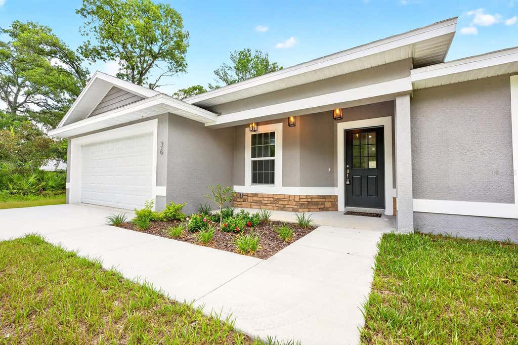 Photo of 36 Fisher Lane Course, Ocklawaha, FL 32179 (MLS # O6418934)