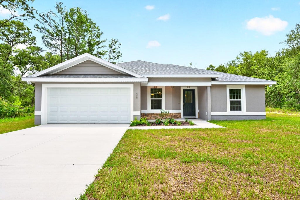 Photo of 36 Fisher Lane Course, Ocklawaha, FL 32179 (MLS # O6418934)