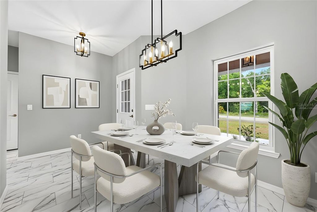 Photo of 36 Fisher Lane Course, Ocklawaha, FL 32179 (MLS # O6418934)