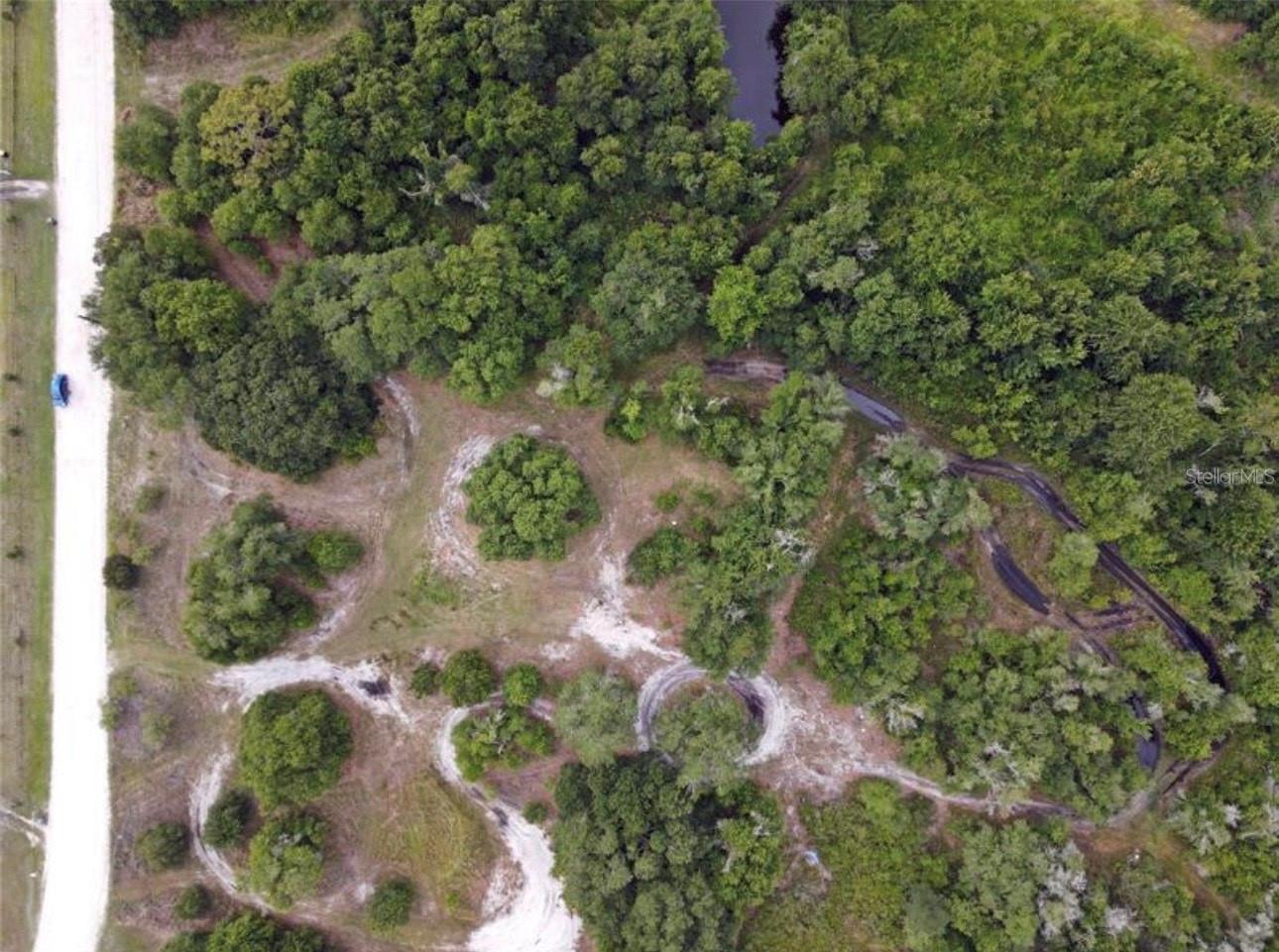 WOODS RANCHING & FARMING TR - Land