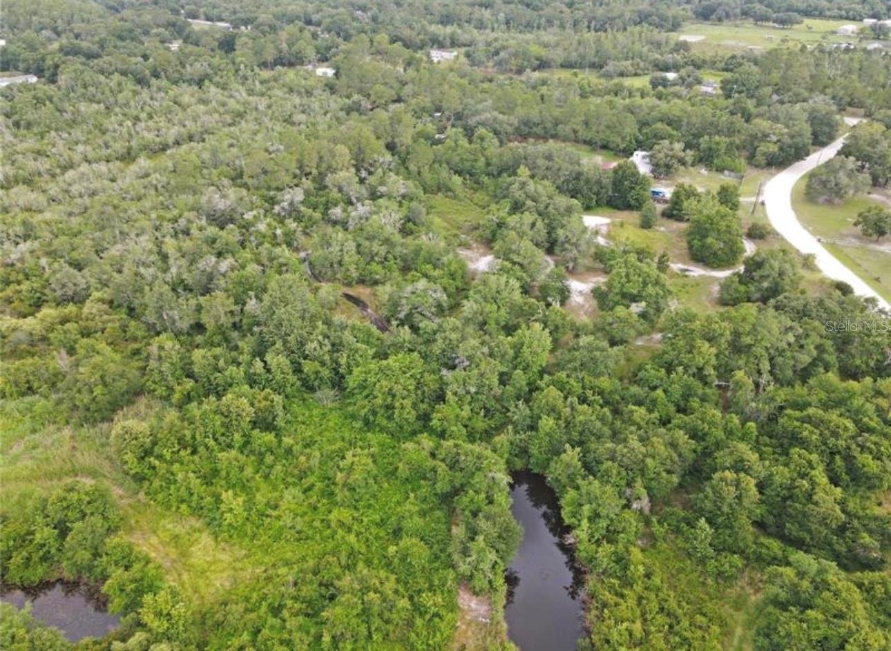 WOODS RANCHING & FARMING TR - Land