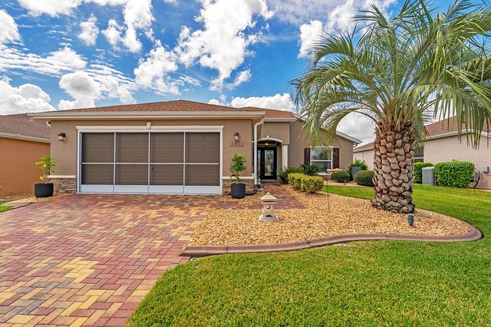 Photo of 5811 Greenbriar Loop, Leesburg, FL 34748 (MLS # G5118062)