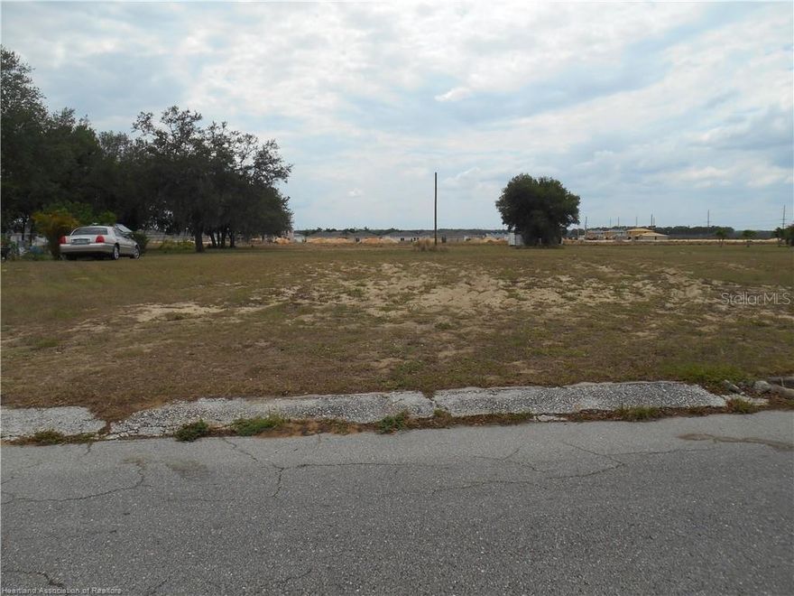 PRIME REAL ESTATE...over .5 acre with NO HOA and some of the highest ground in Sebring! It's located in a quiet neighborhood between the Sebring Parkway and Lakeview Drive. Great place to build that perfect home with shopping, dining and downtown just minutes away. Back of property has road easement. Excellent value for the price!! Come see today. Copy of survey is available for buyer.