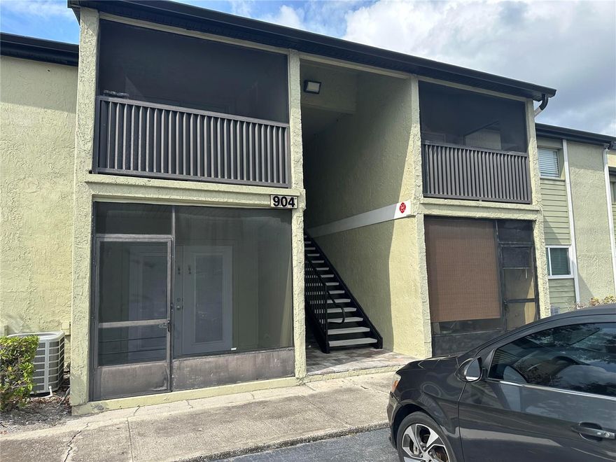 Enjoy comfortable living in this updated 2-bedroom/2-bath 2nd floor condo. The kitchen and bathrooms feature modern cabinetry, granite countertops, and tile flooring throughout adds a touch of elegance. Relax on your private screened-in balcony or take a dip in the community pools. This community also includes lake access, club house, gym, laundry facility and community car wash. Conveniently located near shopping, dining, theme parks, and major highways.