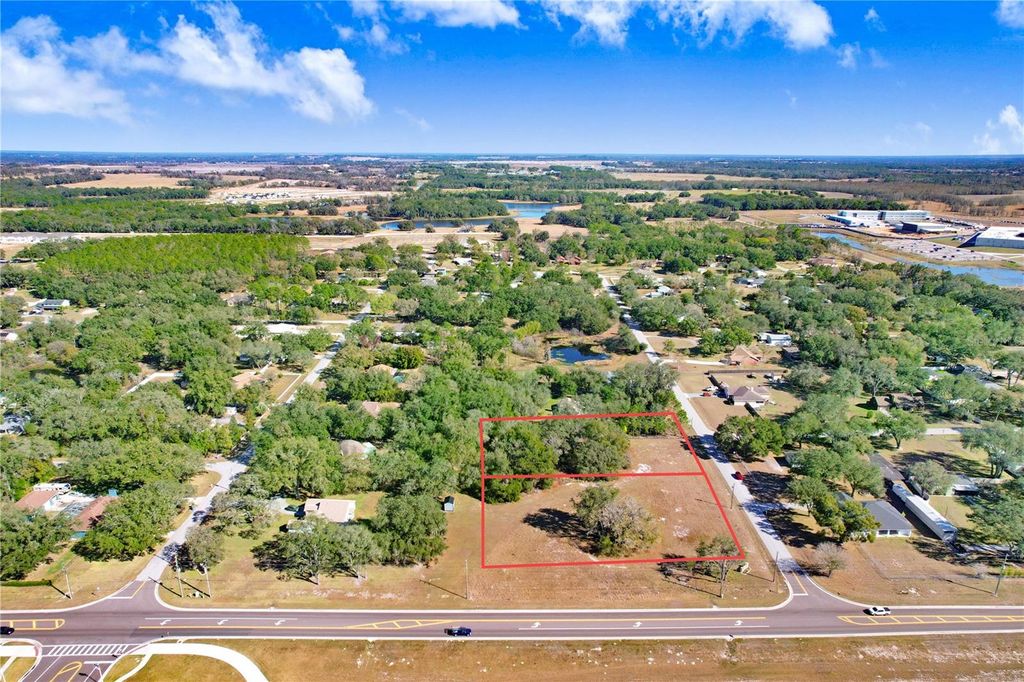 Photo of 32505 Greenwood Loop, Wesley Chapel, FL 33545 (MLS # TB8469372)