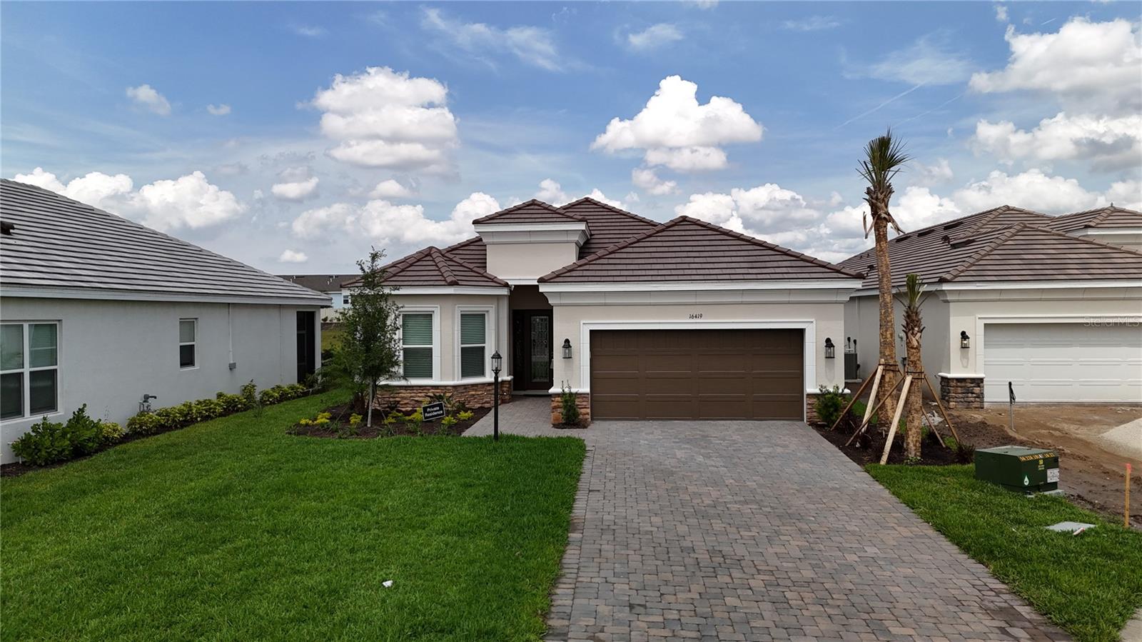 Come explore this newly built luxury home offering 2,520 square feet of living space, featuring 4 bedrooms and 3 bathrooms, available for annual rental in Azario at Lakewood Ranch a prestigious, gated golf community that combines elegance, comfort, and modern convenience. Nestled on a stunning lakefront lot that boasts spectacular water views and a seamless indoor-outdoor flow. Enjoy the screened lanai, which is prewired and plumbed for an outdoor kitchen, TV, theater speakers, and gas fireplace. The owners have spared no expense in creating a home that meets the highest standards, with an open-concept design, 10-foot tray ceilings with crown molding, and 8-foot doors. The extended gourmet kitchen features 42-inch wood cabinetry, quartz countertops, a 56-bottle wine refrigerator, a sink, and stylish pendant lighting. Three spacious bedrooms, each with bay windows overlooking the lake, include en-suite bathrooms with private walk-in closets and built-ins. The fourth bedroom, with elegant French glass doors, offers the perfect space for a home office or a cozy library.
The home comes equipped with essential appliances, including a washer/dryer, gas stove, refrigerator, microwave, dishwasher, garbage disposal, wine cooler, and more ensuring a seamless move-in experience. Additional amenities include a resort-style pool and spa, Esplanade Wellness Center, Bahama Bar, Culinary Center, tennis, pickleball, and bocce courts, event lawn with fire pits, dog park, walking and biking trails, clubhouse, full-time lifestyle manager, an 18-hole championship golf course, and a golf pro shop offering gear, lessons, and golf carts.
Conveniently located near golf, shopping, dining, medical facilities, and Gulf Coast beaches.
Don't miss the opportunity to make this property your new home. Contact us today, as this listing will not remain on the market for long!
Annual Lease. Tenants are responsible for utilities. Tenants will have access to all amenities. Available immediately upon approval.