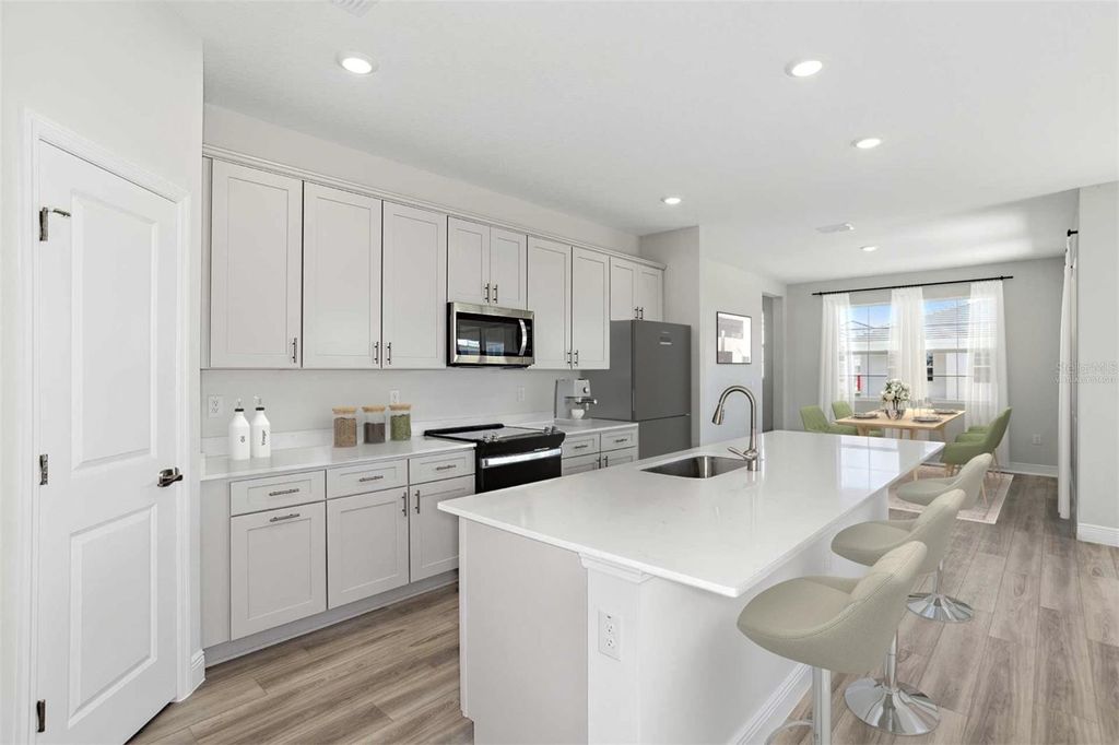 Photo of 9913 Surrey Rose Drive, San Antonio, FL 33576 (MLS # TB8420102)