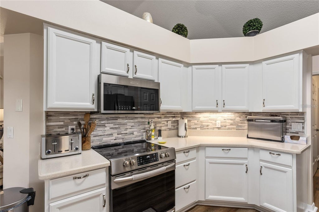 Photo of 25233 Lost Oak Circle, Leesburg, FL 34748 (MLS # O6450760)