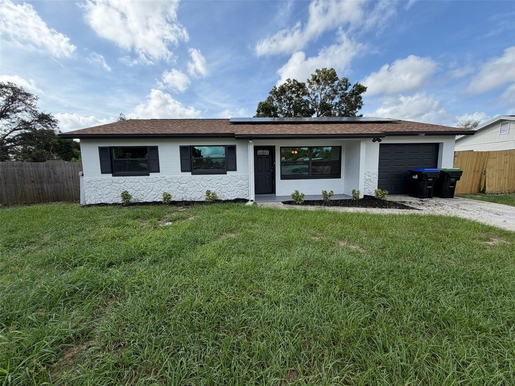 Photo of 7008 Harwick Drive, Orlando, FL 32818 (MLS # O6448369)