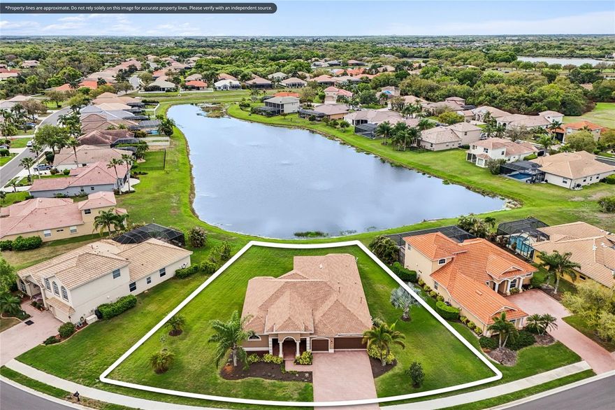 Don't just move. Arrive!  New in Greyhawk Landing! New Roof!  New Paint!  New Kitchen Appliances! Greyhawk Landing, developed over hundreds of acres with community in mind. Residents enjoy Athletic Fields, Athletic Courts, 2 Community Centers with Heated Pools, Fitness, Playground and Spa. There are dozens of Lakes for catch and release fishing. It's a pleasure to stay active with miles of easy trails along the Preserves. Most of the homesites in the community back up to a preserve or a body of water. And, the prettiest of them all is 226 Petrel Trail. From the moment you pull up the paver driveway, the brand-new roof (2026) and fresh exterior paint hint at the meticulous care found within. This rare "York Tuscany" floorplan is one of only 22 premium waterfront homes in the community sitting on over 18,000 sq. ft., offering breathtaking lake views from nearly every room. Imagine waking up in your spacious primary suite, watching the sun rise on the lake from your private sitting area, or soaking away the day in your garden tub. The heart of the home is a bright, open kitchen featuring brand-new 2026 stainless steel appliances and a breakfast bar perfect for morning coffee. Host friends on the massive screened patio—accessible from four different areas of the home—to enjoy those iconic Florida sunsets. With a 3-car garage, energy-efficient "Built-Smart" certification, and no flood insurance required (Zone X), this home offers true peace of mind. Come discover why Greyhawk Landing is more than a neighborhood—it’s a lifestyle.