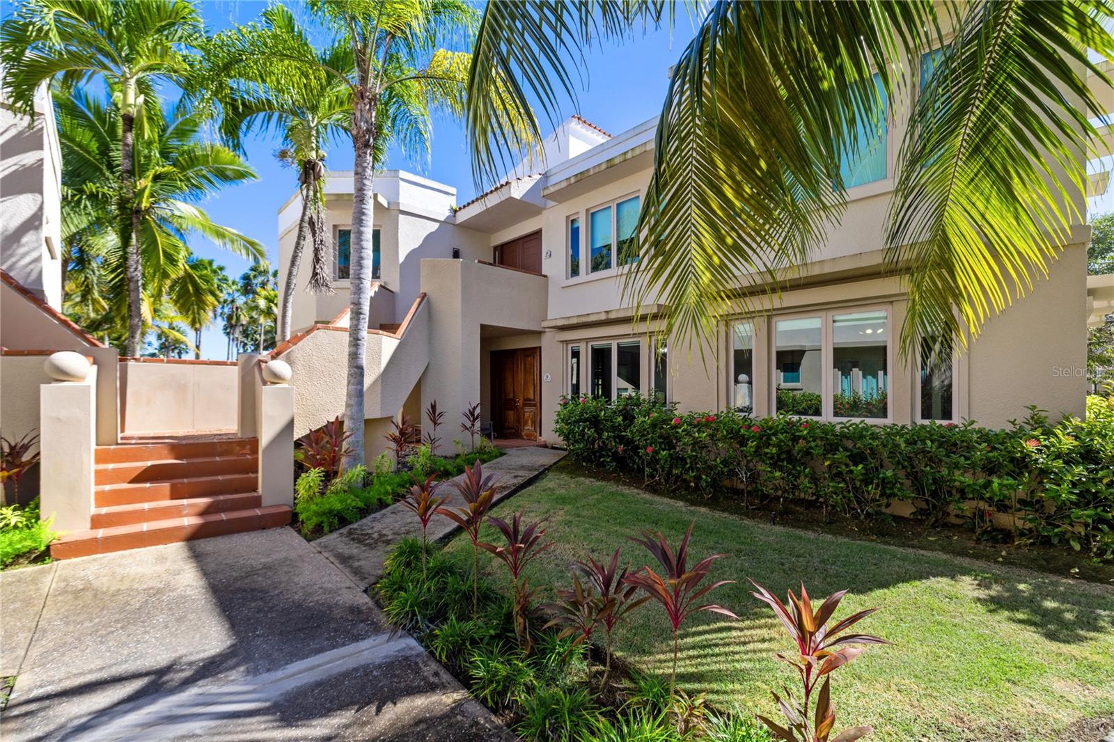 Welcome to your dream oasis in the Lake Side Villas community! This elegant villa boasts 3 spacious bedrooms, 3 full bathrooms, and a generous 2,732 square feet of refined living space. Nestled in a serene, tropical setting, this home offers the perfect blend of luxury, comfort, and tranquility.
As you step inside, you are greeted by an inviting open layout with abundant natural light streaming through large windows. The interior features elegant terracotta flooring, high ceilings, and tasteful finishes throughout. The living and dining areas are perfect for entertaining, while the kitchen comes equipped with all appliances, ample counter space, and a cozy breakfast nook overlooking lush gardens. Each bedroom is a private retreat, complete with ample closet space and serene views of the beautifully landscaped grounds. The master suite is a true sanctuary with its own en-suite bathroom. Step outside to enjoy the expansive terrace, ideal for al fresco dining and lounging. The villa’s lush surroundings include meticulously maintained gardens, a resort-style swimming pool, and a charming lake view that creates a peaceful ambiance.
Lake Side community offers a wide range of amenities including 24 hour security, tennis courts, 3 pools, fitness center, playground, community center and best of all direct beach access. This villa is more than just a home; it’s a lifestyle. Don’t miss the opportunity to make this stunning property yours! Contact us today for a private viewing.
