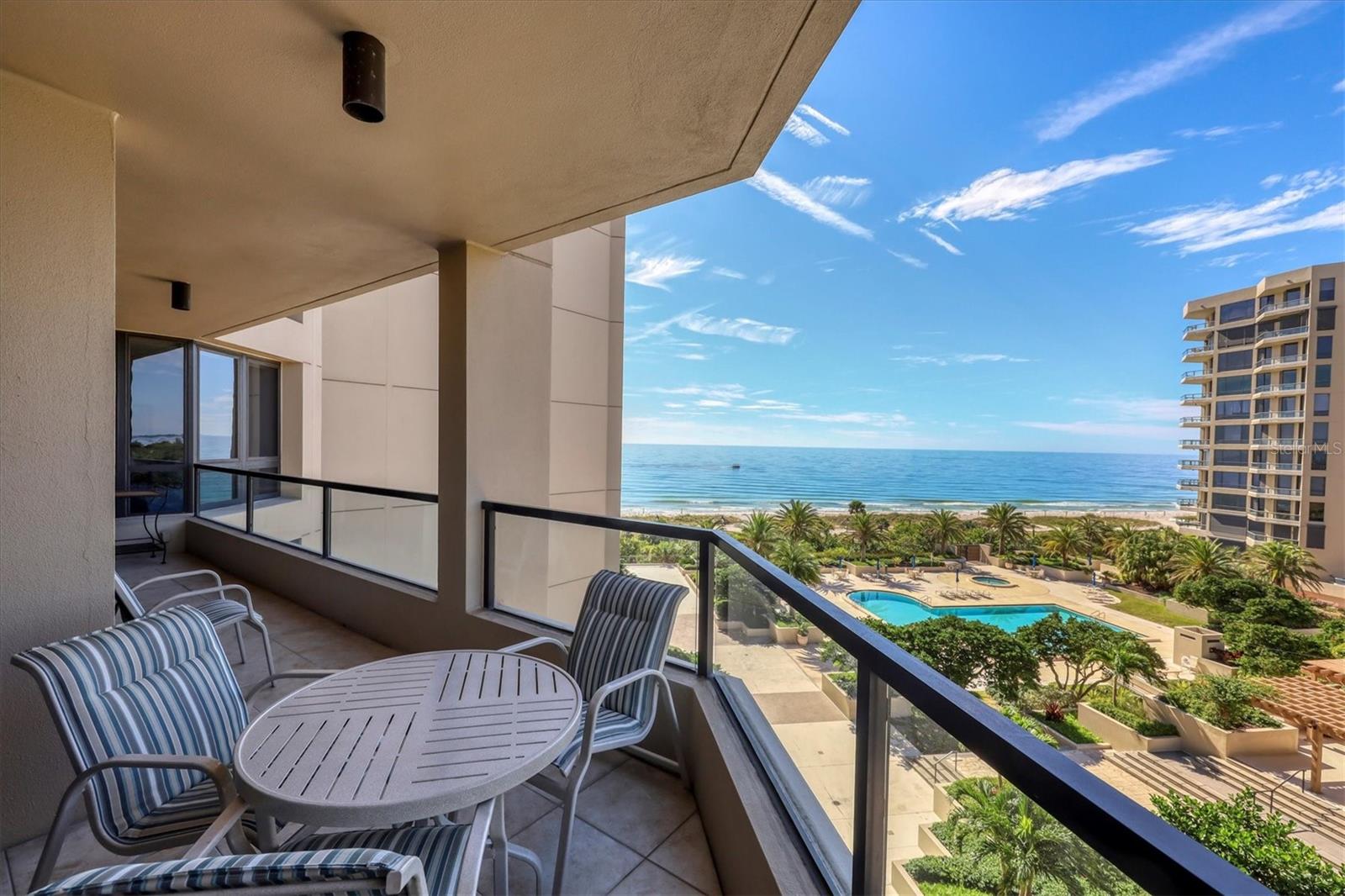 Gulf Front Longboat Key Seasonal Rental! Located at the luxurious Promenade on Longboat Key, this sleek and modern 4th floor condo offers stunning gulf views, has two bedrooms, two baths, and is a true split plan. You will love the updated kitchen, with stainless appliances, granite counters, and sparkling tile backsplash. The living and dining areas have wood flooring, a nice contrast to the stylish seating, dining! The master suite offers wonderful Gulf views and access to the open patio, a king bed, flat screen TV, and walk-in closet. The master bath has dual sinks, soaking tub and an oversize shower. The guest bedroom offers two twin beds, flat screen TV, and views of the lushly landscaped grounds and views of the bay. In unit washer and dryer. This is one of the most sought-after buildings on Longboat Key, this well managed community was recently renovated with elegantly redecorated lobby and corridors, along with two social rooms, the Sunrise and Sunset rooms. There are Men's and Women's workout rooms, four Har-Tru tennis courts, two outdoor gazebos with gas grills and seating, a gorgeous gulf side heated resort style pool and spa, all surrounded by meticulously maintained grounds. Take the walkway to the sparkling sands of the private beach where there are plenty of chairs and chaises to relax and restore! The community offers 24/7 security and concierge services, and on-site management. Wake up, and fall asleep to, the sound of the waves gently lapping the shore. Welcome to Paradise!