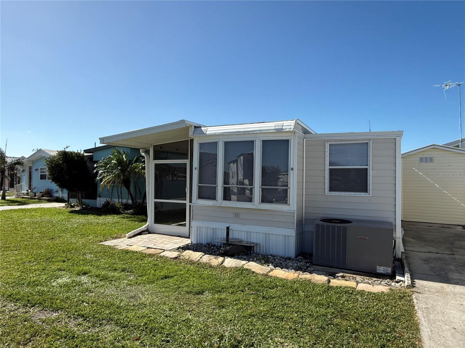 DID YOU READ THAT RIGHT?!! $64,900!! NOW THAT'S A DEAL!
Welcome to this charmingly updated 1-bedroom, 1-bathroom home in the upbeat 55+ community of Holiday Travel Park, just a short drive from the beach! Perfect for year-round living or a seasonal retreat, this delightful home offers a relaxing lifestyle with a host of recent upgrades, including a brand-new 2024 AC unit and a 2021 water heater. The open plan kitchen features sleek granite countertops, a new oven, and contemporary finishes, making it ideal for both cooking and entertaining. The large added walk-in closet provides plenty of storage space, while the tiled bathroom adds a touch of elegance with its stylish counters.
Step outside to your private lanai, newly screened for your enjoyment, where you can relax and soak in the Florida sunshine. The community offers a wealth of activities designed to keep you active and engaged, with a variety of social events, and recreational opportunities. Whether you're taking advantage of the nearby beach, exploring the surrounding area, or participating in community events, you'll find that this home offers both comfort and convenience in an unbeatable location. Come experience the best of coastal living in this gem! Don't waste any time, schedule your private showing now!
