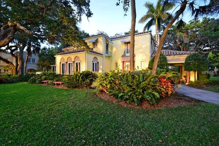 The J.G. and Pearl Whitfield/Taylor home - Embrace history in one of the Crown Jewels of Sarasota overlooking recently refurbished Indian Beach. Nesltled among the majestic live oaks and filled with the soothing breezes off Sarasota Bay, this John Ringling era Mediterranean Revival home is being offered for sale for the first time in 35 years. Relive the elegance and grandeur of Sarasota's rich past in this historical home listed on the National Register of Historic Places where most rooms provide full views of Sarasota Bay towards Longboat Key. Built in the 1920's, this Italian style villa is filled with rich architectural detail and exceptional craftmanship. SOme examples are the hand-carved marble, solid oak floors, Juliet balconies, terraces, screened porches, and walled-in gardens. The Whitfield home is located in the historic district of Indian Beach minutes to the Ringling Museum, Asolo Theater, downtown Sarasota and Sarasota's beaches and situated to take advantage of the full view of Sarasota Bay. Picture yourself living in one of the most beautiful homes in Sarasota (as written in the Sarasota Herald Tribune).