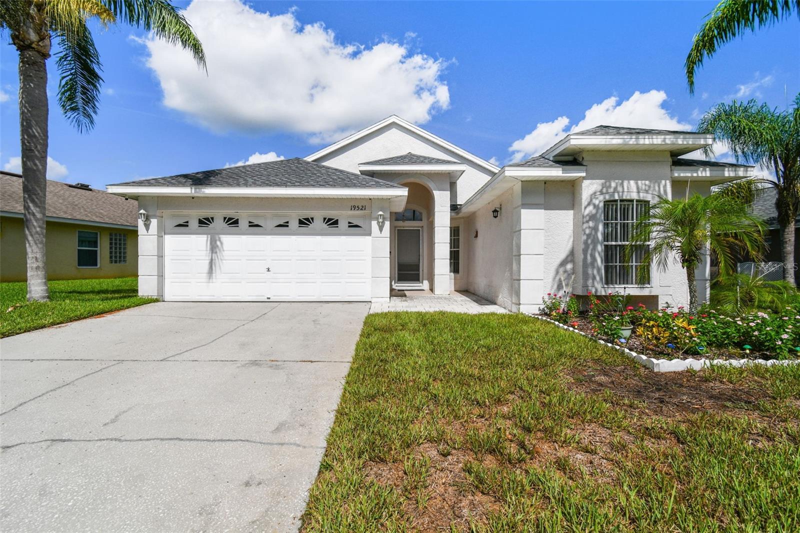 This charming 3-bedroom, 2-bath, 2-car garage home, located in the highly sought-after Steinbrenner High, Martinez Middle, and McKitrick Elementary school district, offers an open split floor plan with a spacious kitchen seamlessly flowing into the great room, filled with natural light from large windows. The master bedroom boasts his-and-her walk-in closets and a tranquil water view, while the serene backyard with a beautiful pond is perfect for relaxing or entertaining. Ideally situated near shopping, highways, golf courses, restaurants, medical facilities, and top-rated schools, this home has no CDD fees, a low HOA, and is in a no-flood zone. Recent updates include a 2021 roof, 2020 patio, 2025 stove and water softener, 2023 microwave, and other improvements like updated floors, fridge, washer, dishwasher, and screen door, ensuring peace of mind for years to come. Whether you're seeking your dream home or a great investment opportunity, this home truly has it all—schedule your showing today!