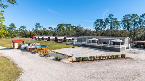 Tiny photo for 14181 SE 211th Ct, Umatilla, FL 32784 (MLS # OM713859)