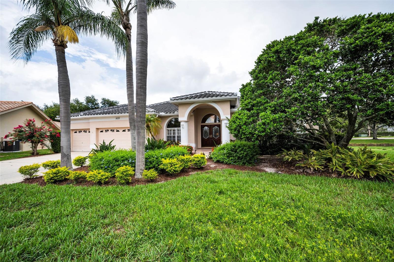 Welcome to Westwind at Ridgemoor – A Prestigious Gated Retreat
Tucked away on a serene cul-de-sac, this beautifully maintained residence offers breathtaking pond and private pool/spa views from nearly every room. Located in the coveted, gated enclave of Westwind, this 4-bedroom, 3-bathroom home with a spacious office/den and 3-car garage embraces Florida elegance and comfort.
The thoughtfully designed triple split floorplan provides space and privacy, including a luxurious owner’s suite with sliders to the lanai, a large walk-in closet, garden tub, separate shower, and dual vanities. The light-filled kitchen features granite countertops, rich wood cabinetry, stainless steel appliances, and a long breakfast bar—perfect for gatherings.
Relax in the expansive family room, where triple sliding glass doors frame stunning water views and a cozy gas fireplace adds charm. Step outside to your covered lanai and enjoy seamless indoor-outdoor entertaining.
A private back bedroom with an en suite pool bath makes an ideal in-law suite or teen haven, while two additional bedrooms share a private wing and full bath.
With a new A/C system (2025), a durable tile roof (2014), and proximity to world-renowned beaches, golf, dining, and top-rated schools, this home will sell fast!