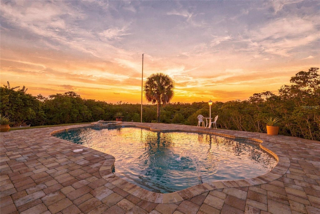 Photo of 9606 62nd Avenue N, St Petersburg, FL 33708 (MLS # TB8556001)