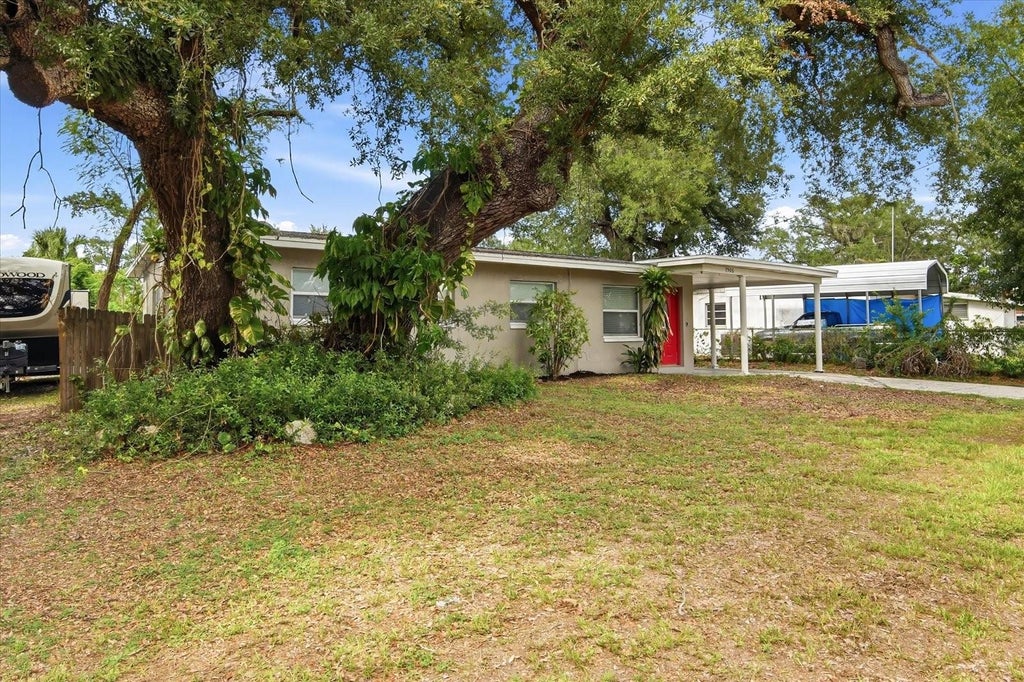 Photo of 7506 Coral Vine Lane, Tampa, FL 33619 (MLS # TB8525491)