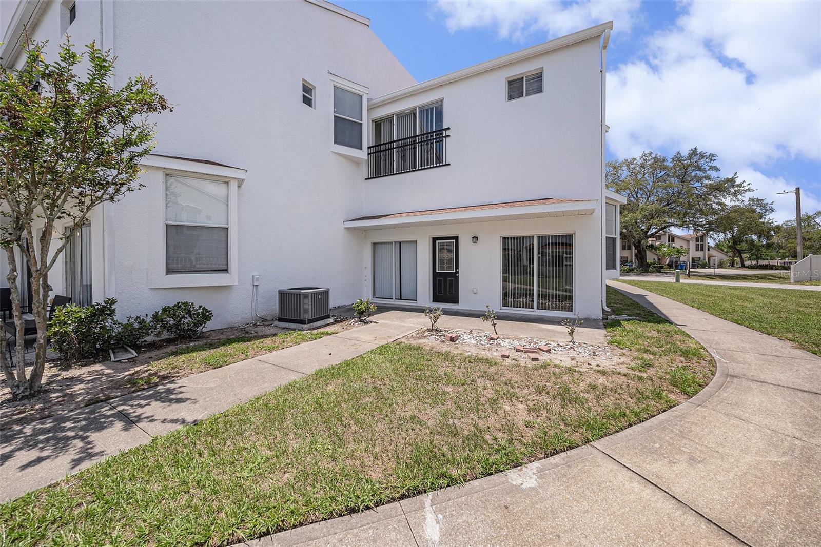 This elegant three-level townhome is ideally located near Busch Boulevard and Armenia Avenue in Tampa, FL, offering a vibrant lifestyle with easy access to major amenities. The 3-bedroom, 3.5-bathroom home features a spacious two-car garage, high ceilings, and abundant natural light. Inside, a beautifully designed kitchen boasts sleek granite countertops and stainless-steel appliances. The first floor includes a stylish kitchen, a half bath, and a large living/dining room combo with vaulted ceilings and sliding glass doors. The second-floor owner's suite serves as a private retreat with a luxurious ensuite bath, a walk-in closet, and a ceiling fan. The third floor offers two guest bedrooms, each with ensuite bathrooms. The townhome community sits across from Orange Grove Park, featuring a baseball diamond, jogging path, and playground. Nearby, University Mall and International Plaza provide ample shopping, while dining options range from casual spots to upscale eateries. Residents enjoy proximity to I-275, Tampa International Airport, and major roads for easy commuting. Entertainment abounds with Busch Gardens nearby, along with local movie theaters and Raymond James Stadium. The University of South Florida is within reach, offering educational opportunities. For beach lovers, the Gulf Coast's stunning shores are just a drive away. Whether seeking excitement or relaxation, this townhome delivers the best of Tampa living.
