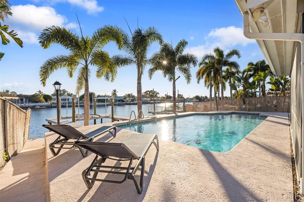 Photo of 5702 Riddle Road, Holiday, FL 34690 (MLS # TB8471889)