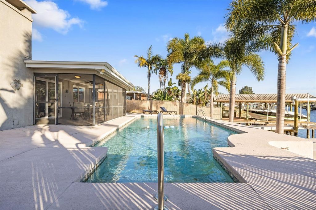 Photo of 5702 Riddle Road, Holiday, FL 34690 (MLS # TB8471889)