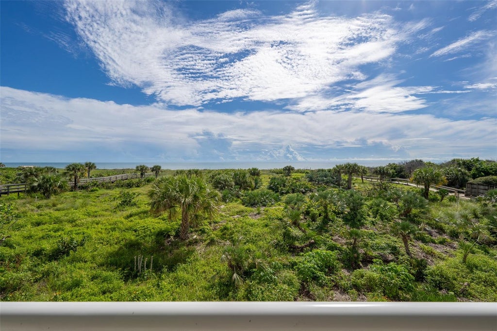 Photo of 3400 Ocean Beach Boulevard #210, Cocoa Beach, FL 32931 (MLS # O6441933)