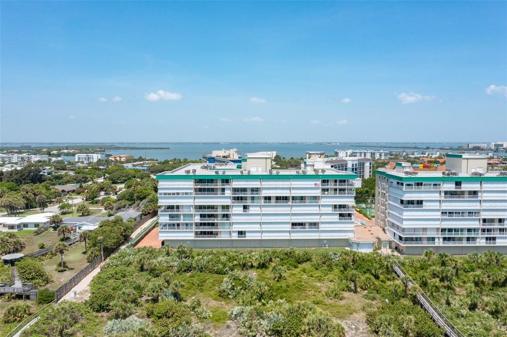 Photo of 3400 Ocean Beach Boulevard #210, Cocoa Beach, FL 32931 (MLS # O6441933)