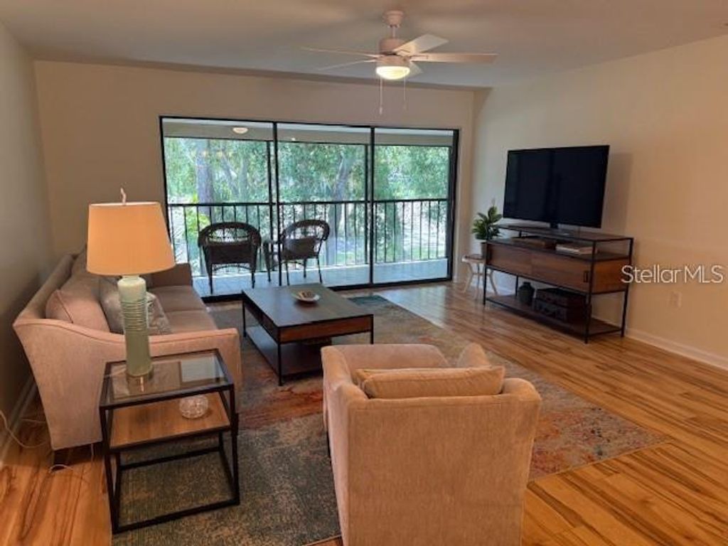 Photo of 6120 Country Club Way #207, Sarasota, FL 34243 (MLS # A4688240)