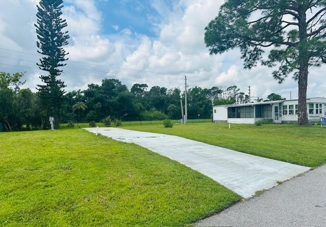 Motivated seller, Bring all offers! Vacant Lot awaits your new Manufactured home. Located in an active, gated, 55+ community. Holiday Park has two parts. This lot lies in the pet-friendly area.
Community features 2 clubhouses, 2 heated swimming pools, library, fitness center, tennis courts, shuffleboard, pickle ball, bocce ball, horseshoe pits, ping pong, card room, billiards, ceramics & more. Water, sewer & electric hook ups in place. Maintenance fee is included in the annual property taxes. Close to restaurants, shopping, Warm Mineral Springs and the new Wellen Park.