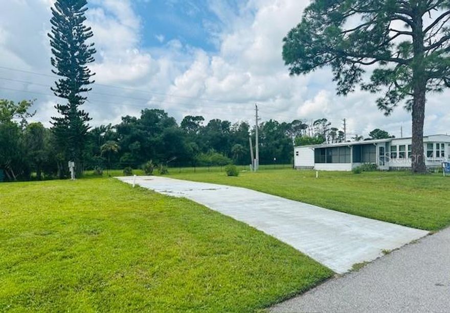 Motivated seller, Vacant Lot awaits your new Manufactured home.  Located in an active, gated, 55+ community.  Holiday Park has two parts.  This lot lies in the pet-friendly area.  Holiday Park is a very Active community.
Community features 2 clubhouses, 2 heated swimming pools, library, fitness center, tennis courts, shuffleboard, pickle ball, bocce ball, horseshoe pits, ping pong, card room, billiards, ceramics & more. Water, sewer & electric hook ups in place. Maintenance fee is included in the annual property taxes.  Close to restaurants, shopping, Warm Mineral Springs and the new Wellen Park.
The previous manufactured home was removed prior to the hurricanes of 2024.