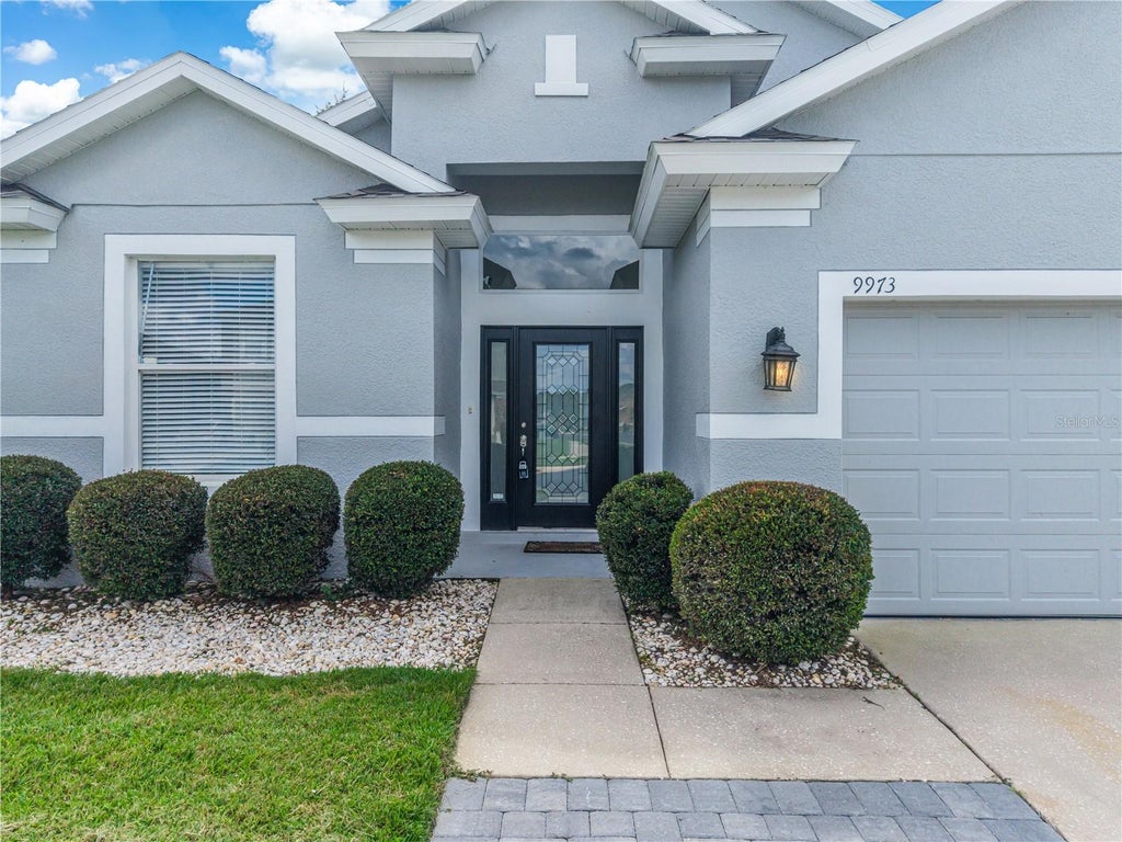 Photo of 9973 Cypress Knee Circle, Orlando, FL 32825 (MLS # O6444540)