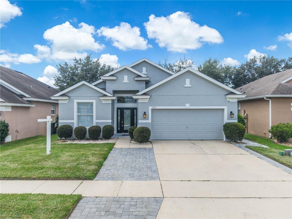 Photo of 9973 Cypress Knee Circle, Orlando, FL 32825 (MLS # O6444540)