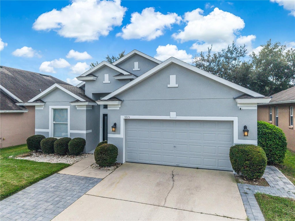 Photo of 9973 Cypress Knee Circle, Orlando, FL 32825 (MLS # O6444540)