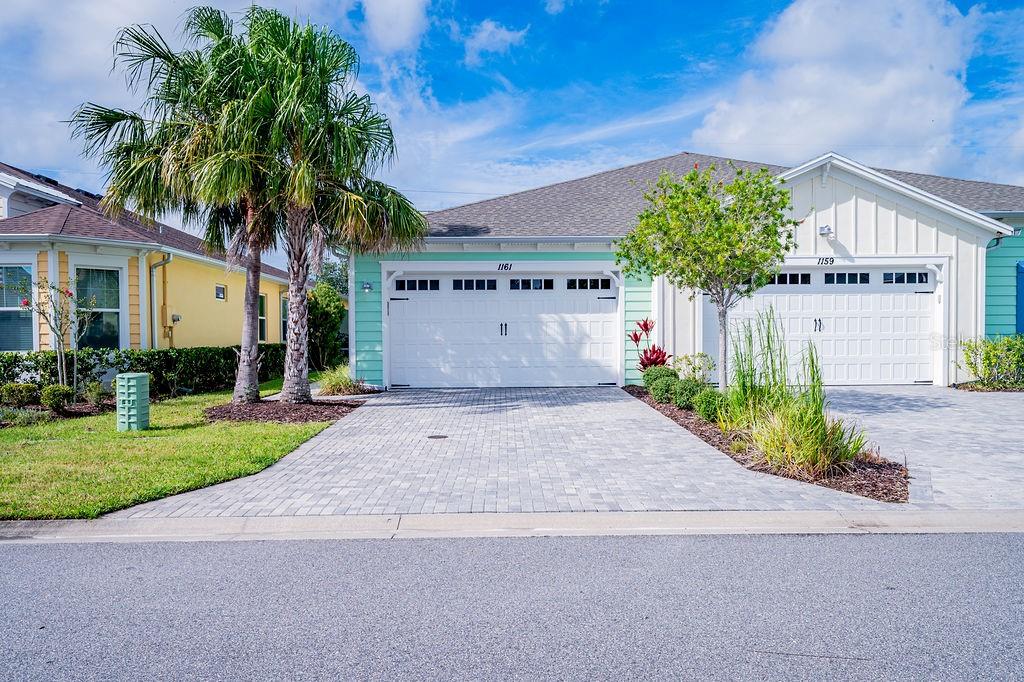 LIVE THE MARGARITAVILLE LIFESTYLE! Welcome to 1161 Fins Up Court, a beautifully maintained 2-bedroom, 2-bath villa tucked away on a peaceful cul-de-sac in the highly sought-after Latitude at Margaritaville — Daytona Beach’s premier 55+ active community inspired by Jimmy Buffett’s island state of mind. Built in 2019, this 1,509 sq.ft. single-level home offers open-concept living, a spacious kitchen with stainless-steel appliances, in-unit laundry, and a 2-car garage. The smart split floor plan provides privacy between the primary suite and guest bedroom — perfect for visiting friends or extended stays. Enjoy ample natural light and low-maintenance living with everything you need already in place.