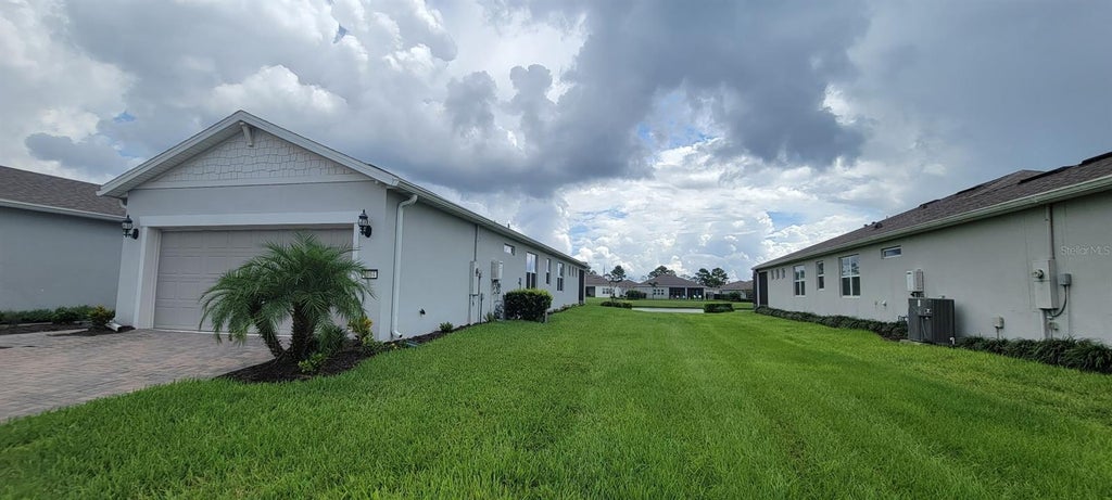 Photo of 2984 Cherry Blossom Loop, Saint Cloud, FL 34771 (MLS # O6441555)