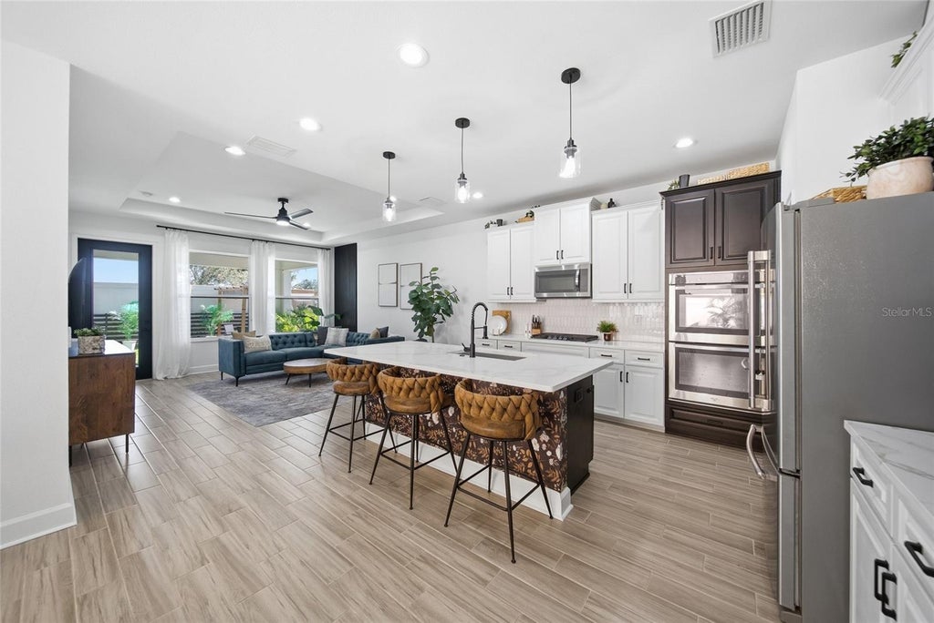 Photo of 29218 Perilli Place, Wesley Chapel, FL 33543 (MLS # TB8558949)