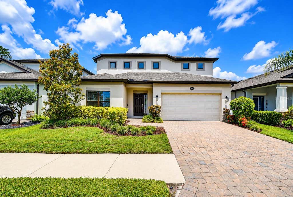 Photo of 1621 Leaf Flower Lane, Lutz, FL 33558 (MLS # TB8530238)