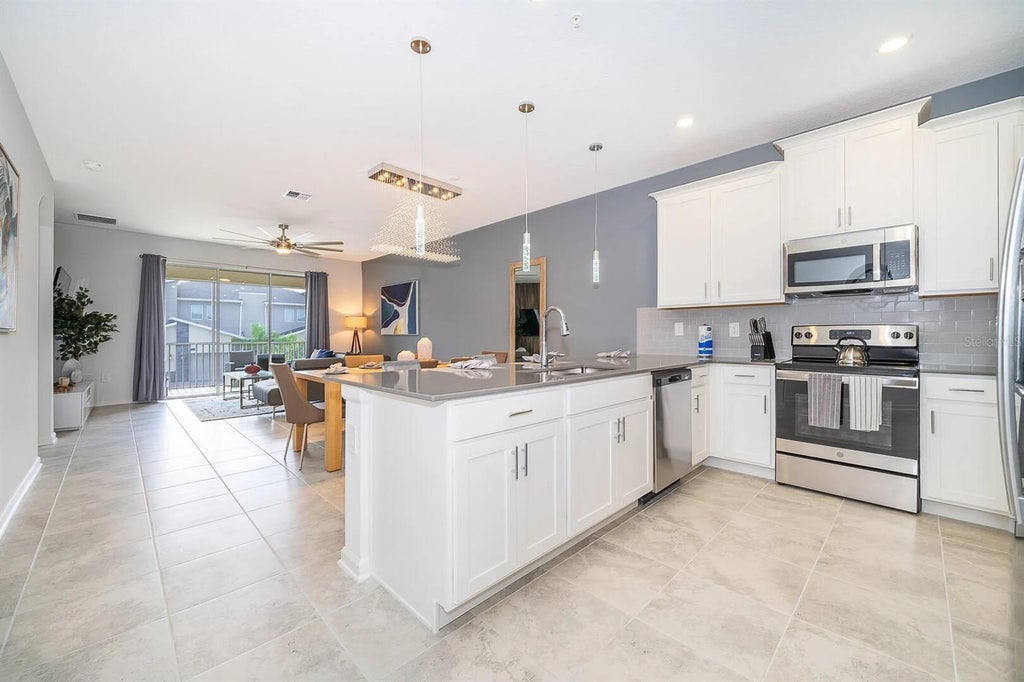 Photo of 8867 Cabot Cliffs Drive #103, Davenport, FL 33896 (MLS # S5159642)