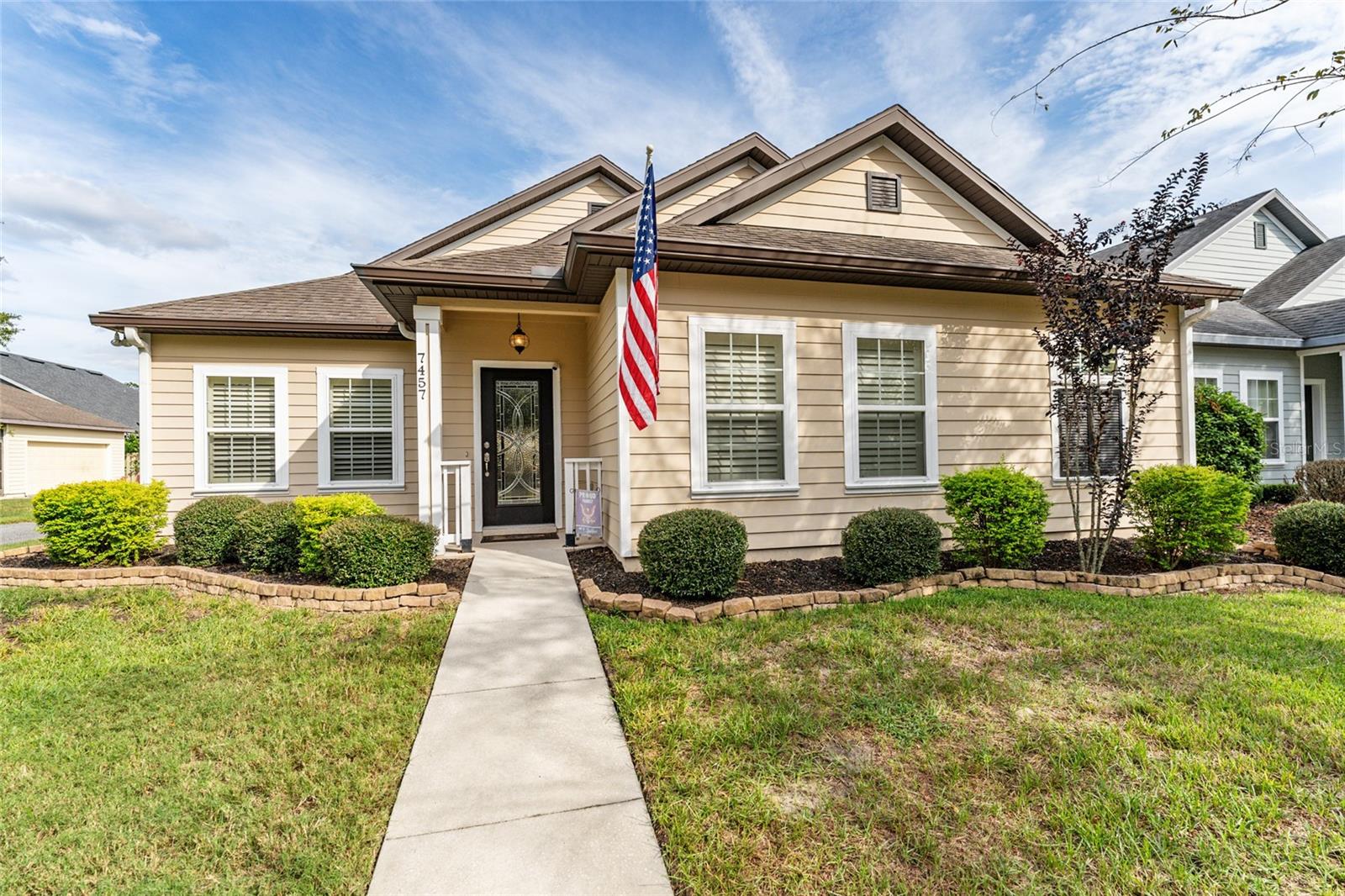 Welcome to the charming and highly sought after SW community of Longleaf! This 3/2 home boasts 10ft ceilings throughout, beautiful hand-scraped wood flooring and crown molding for an upscale feel. The open floorplan is perfect for entertaining guests. Spacious Master Bedroom with en-suite and large walk-in closet. The lovely kitchen has stainless steel appliances, an abundance of cabinets, new backsplash and countertops. New (2025) microwave, stove and oven with air fryer. Two guest bedrooms located off main living area share the 2nd bathroom with tub/shower combo and granite countertops. Plantation shutters installed on all front windows as well living room windows. An abundance of natural light in all living areas. Enjoy the gorgeous views and beautiful Florida weather on your outdoor oasis! The gorgeous, oversized paver patio with firepit and café lights is the perfect place to wind down. This property is on a corner lot and therefore has extra space and privacy. Fully-fenced backyard with privacy fence. HVAC 2017, Roof 2010.This home is on CLAY electric. Longleaf HOA maintains front/side lawn and has a clubhouse, beach entry pool, splash area, tennis/basketball courts and a playground. Great location and close proximity to University of Florida, Santa Fe College, UF Health, HCA Florida North Florida Hospital, Butler Plaza and Celebration Point. Call today to tour this property! This information is deemed to be true and correct at time of entry but not guaranteed. Please verify details.