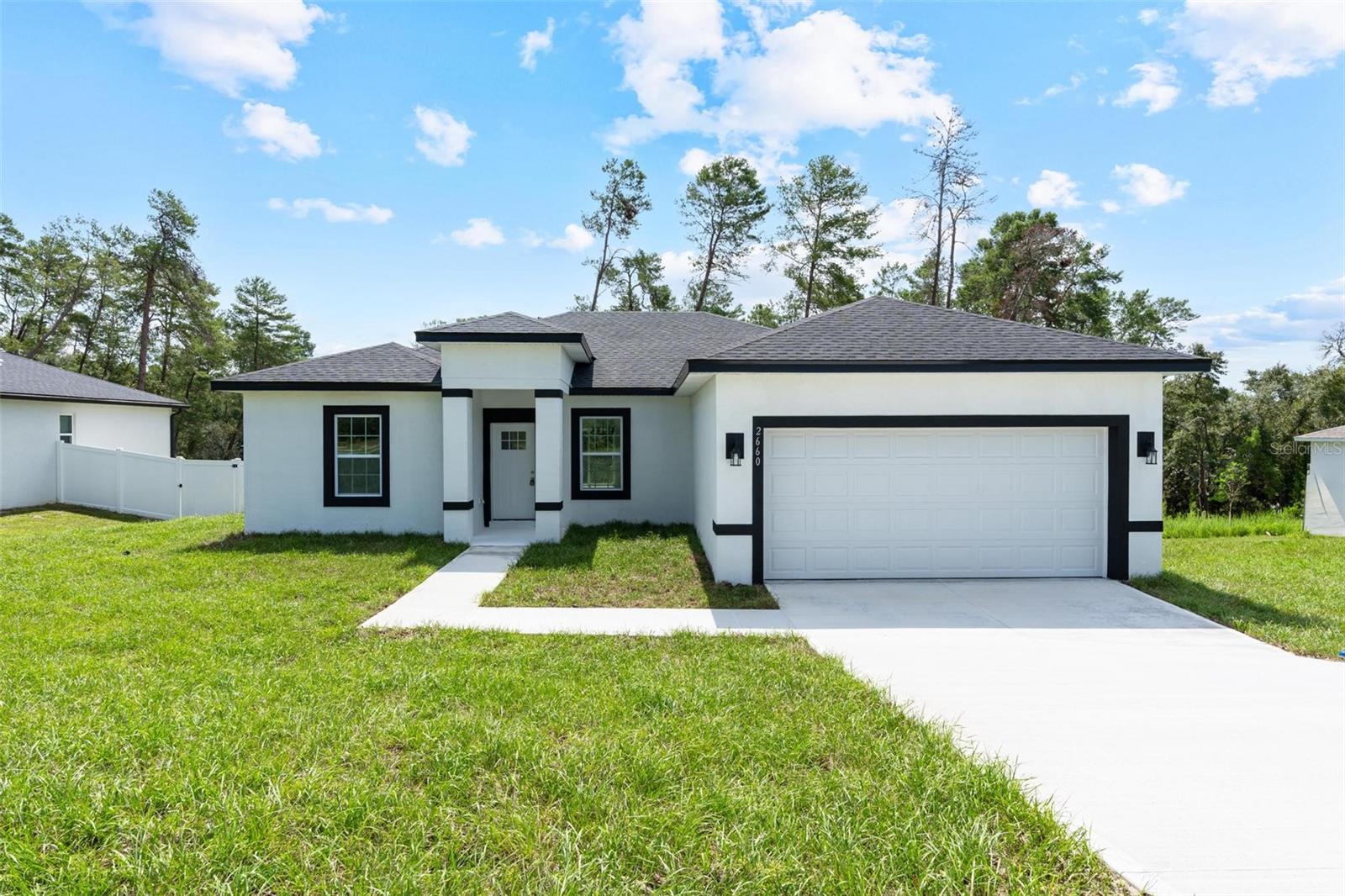 Beautiful BRAND NEW CONSTRUCTION!!
4-Bedroom Home with Open Floorplan in PRIME Ocala Location
NO HOA!!! NO CDD!!
Welcome to this stunning brand-new construction 4-bedroom, 2-bathroom home nestled in one of Ocala’s most sought-after neighborhoods. Combining space, style, and privacy, this move-in-ready gem offers exceptional value and timeless appeal — perfect for families, first-time buyers, or anyone seeking comfort and convenience.
Step inside to discover a bright, open floorplan that seamlessly connects the living and dining areas — ideal for both everyday living and entertaining. The heart of the home is a beautifully designed kitchen with modern finishes, sleek countertops, ample counter space, and major appliances included, such as refrigerator. Whether you’re hosting dinner or enjoying a quiet night in, this kitchen offers both form and function.
The spacious primary suite is a true retreat, filled with natural light and complete with a soaking tub and separate walk-in shower, offering a spa-like experience right at home. The three additional bedrooms are generously sized with built-in closets — perfect for family, guests, or a home office.
Throughout the home, you’ll enjoy the elegance of durable vinyl plank flooring, central A/C, and thoughtful details that blend comfort with modern style.
Outside, the oversized backyard provides plenty of room to build a pool, making it the perfect setting to enjoy the Florida lifestyle or entertain friends and family.
? Additional features include:
2 full bathrooms
Attached 2-car garage
All major kitchen appliances included (refrigerator, oven, dishwasher, microwave)
Elegant finishes, beautiful countertops, and modern design throughout
?? Prime Location:
Only 3 minutes by car to the brand-new high school currently under construction.
Just 5 minutes by car to shopping, dining, pharmacies, and other conveniences.
Easy access to major roadways, putting all of Ocala at your fingertips.
Don’t miss this rare opportunity to own a beautiful new construction home in a fantastic location. Schedule your private showing today!