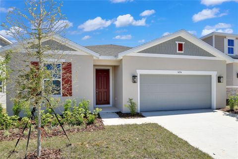 Photo of 1694 Sugarbelle Circle, Mascotte, FL 34753 (MLS # S5124620)