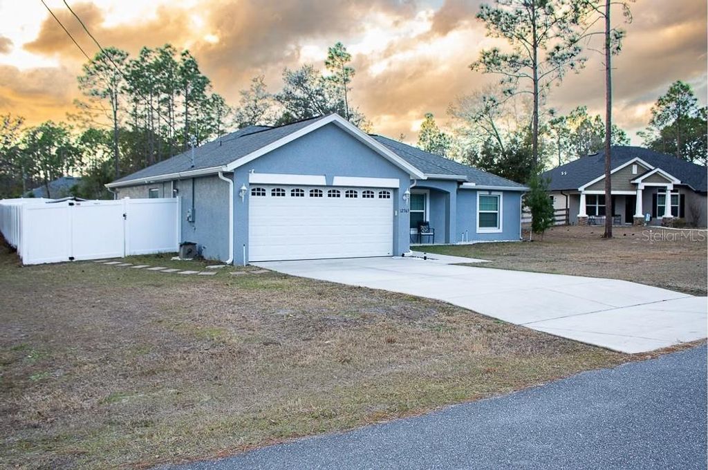 Photo of 12365 Indigo Bunting Road, Weeki Wachee, FL 34614 (MLS # TB8477154)
