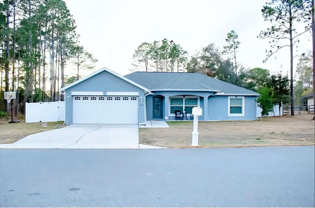 Photo of 12365 Indigo Bunting Road, Weeki Wachee, FL 34614 (MLS # TB8477154)