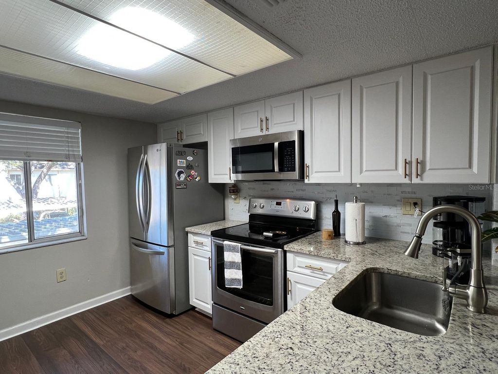 Photo of 102 Palmetto Court #2, Oldsmar, FL 34677 (MLS # W7884308)