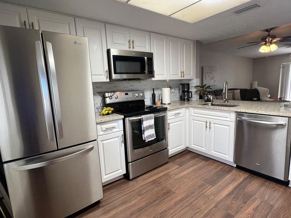 Photo of 102 Palmetto Court #2, Oldsmar, FL 34677 (MLS # W7884308)