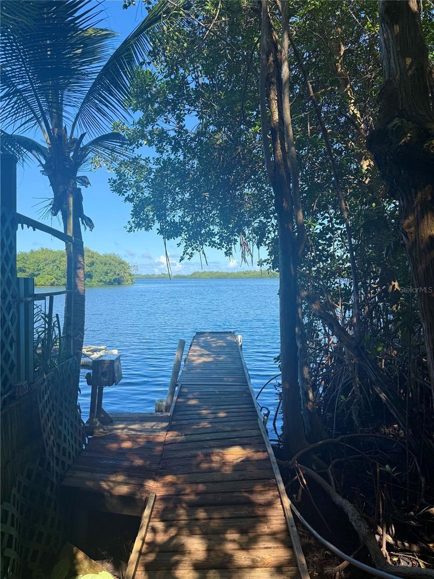 Rare fixer-upper opportunity!
This unique apartment offers the exceptional advantage of a private dock right in the backyard, a truly hard to find feature. The property features 3 bedrooms, 2 bathrooms, a dedicated laundry room, kitchen, and an open living and dining area.
Enjoy outdoor living with a private terrace and deck, ideal for relaxing or entertaining. The unit also includes two side-by-side parking spaces and is located within a community with double controlled access, providing added privacy and security.
An excellent opportunity for buyers looking to renovate and add value in a highly desirable waterfront setting. Renderings are for illustrative purposes only and represent a conceptual vision of a potential renovation.