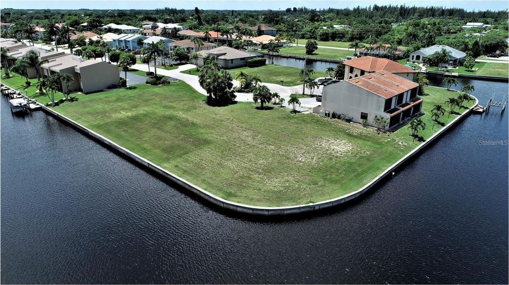 Photo of 1447 Mediterranean Drive, Punta Gorda, FL 33950 (MLS # A4591943)