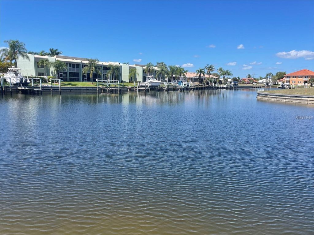 Photo of 1447 Mediterranean Drive, Punta Gorda, FL 33950 (MLS # A4591943)